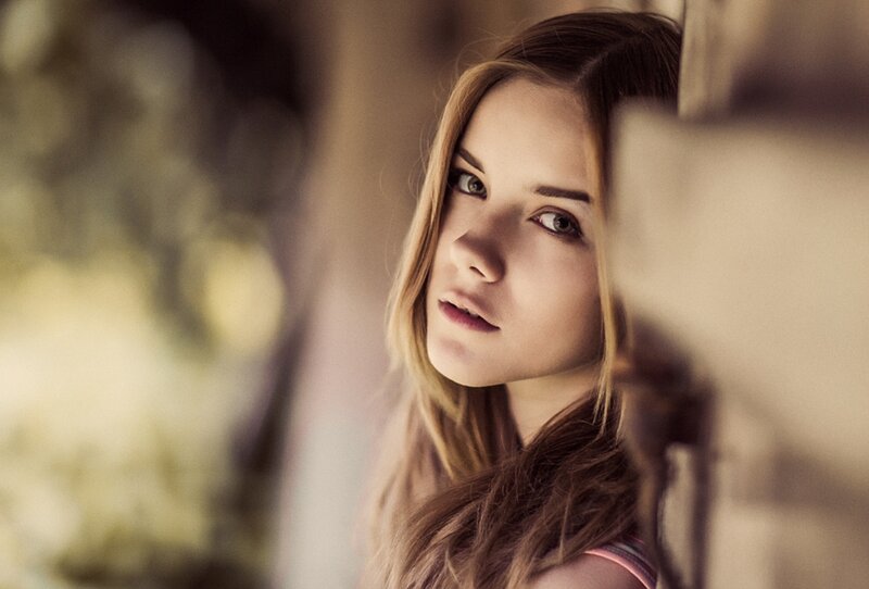 Young Woman with Brown Hair — Contemplative