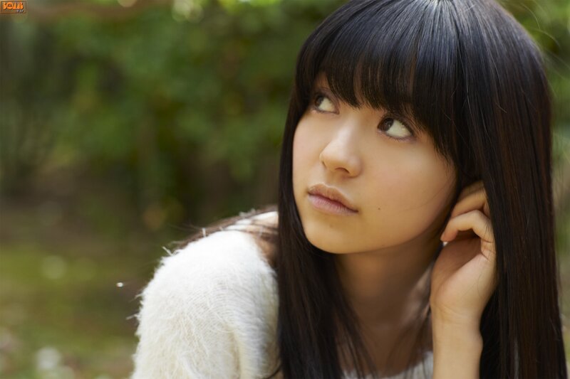 Young Woman with Dark Hair — Black, Contemplative