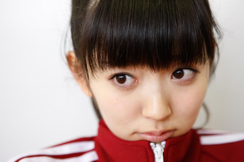 Young Woman with Dark Hair — Red