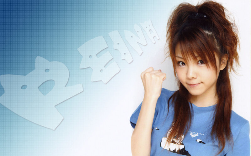 Young woman with fist raised