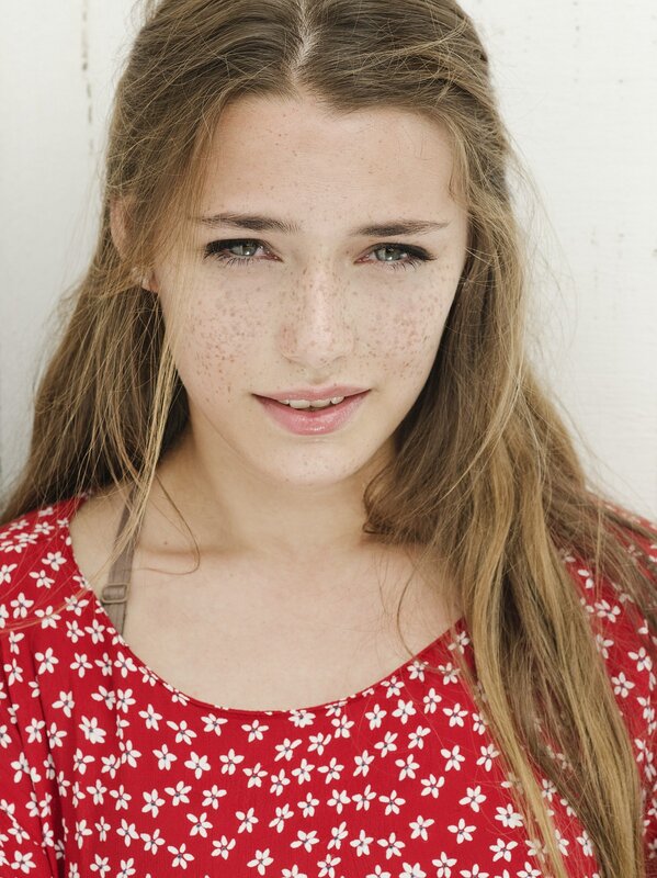 young woman with freckles