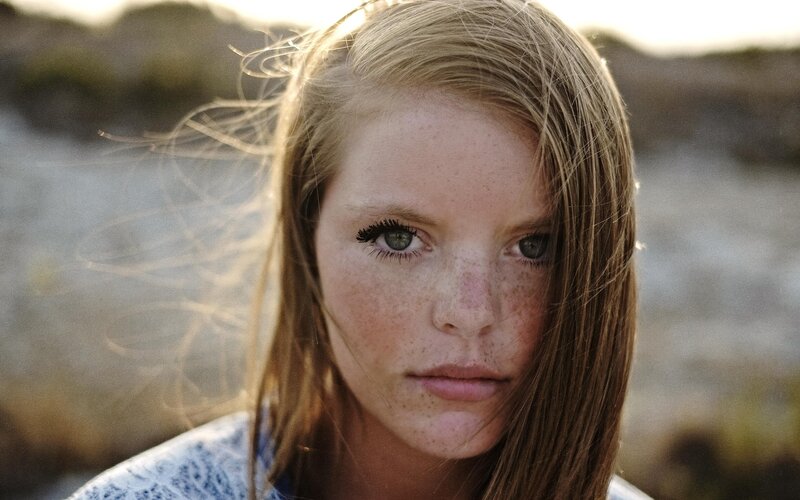 Young Woman with Freckles — Brown, Calm, Sunset
