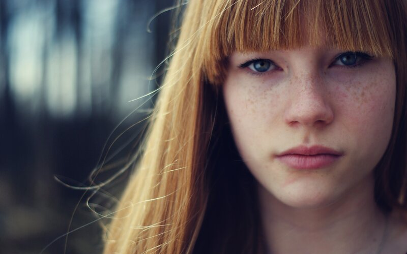 Young Woman with Freckles — Brown, Serious, Photograph