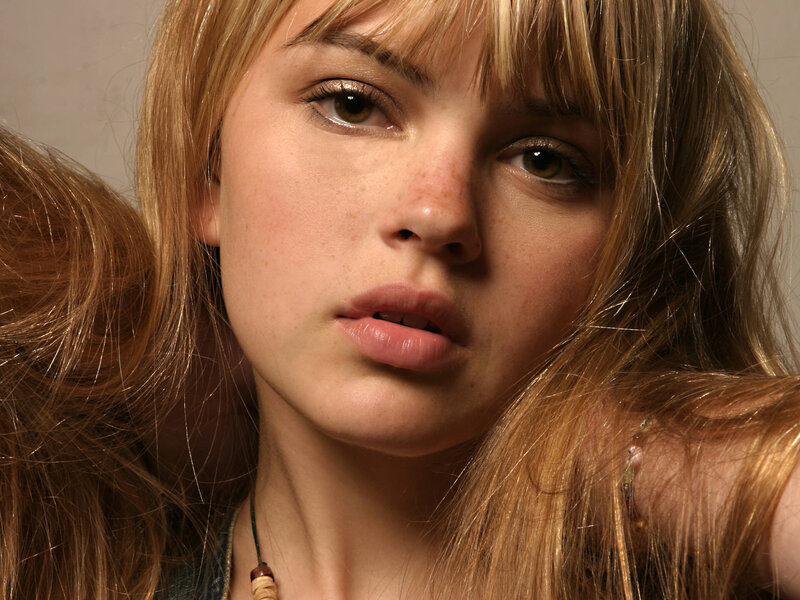 Young Woman with Freckles — Brown