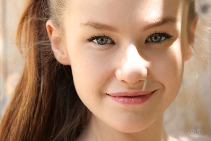 Young Woman with Green Eyes — Brown, Calm, Afternoon