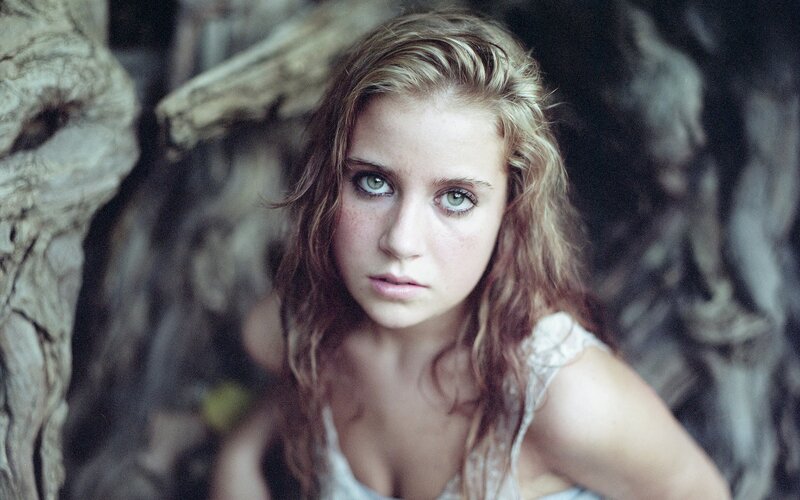 Young Woman with Green Eyes — Brown, Serious, Photograph