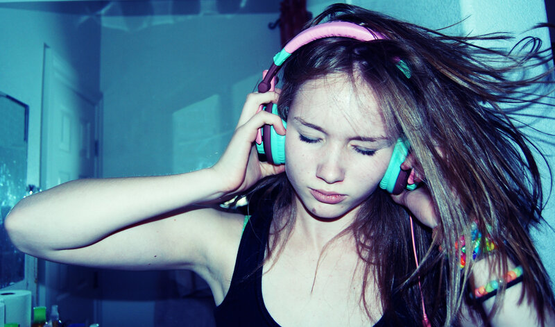 Young Woman with Headphones — Blue