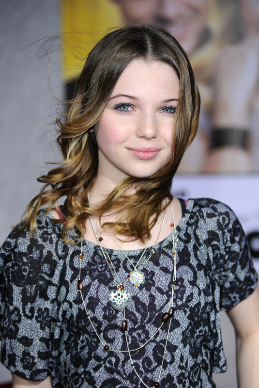 young woman with layered necklaces