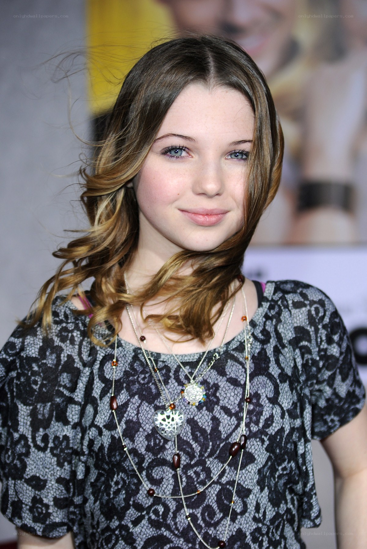 young woman with layered necklaces