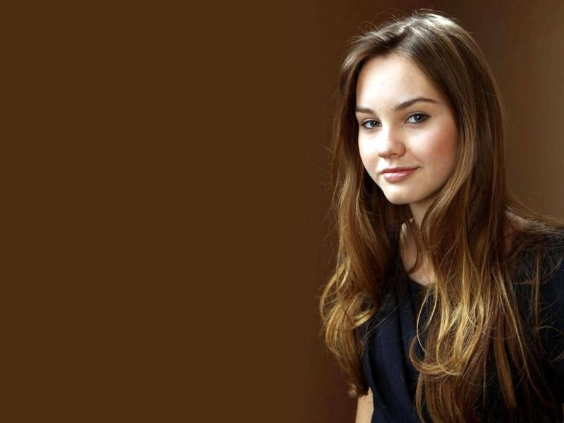 Young Woman with Long Hair — Brown, Neutral, Photograph, Black Shirt