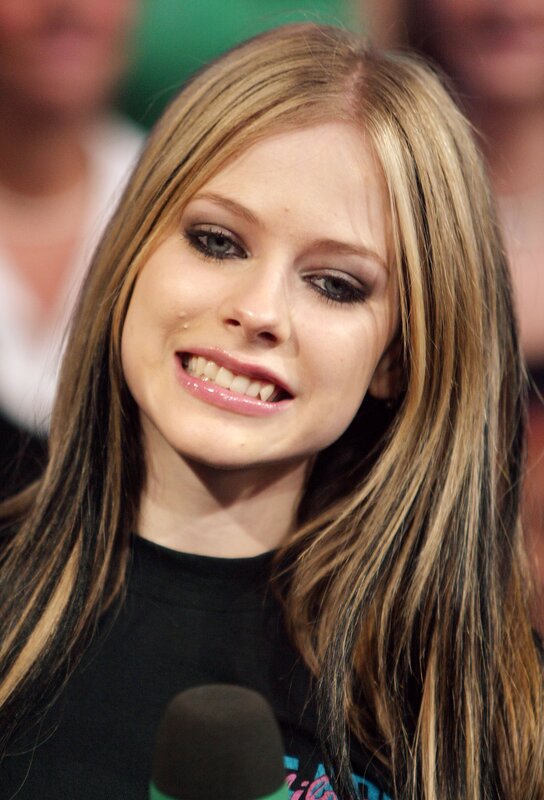 Young Woman with Long Hair — Brown, Neutral, Photograph, Microphone