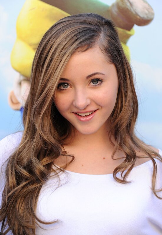 Young woman with long hair smiling