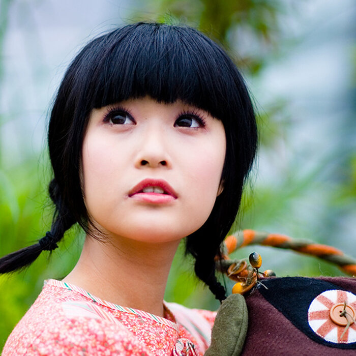 young woman with pigtails