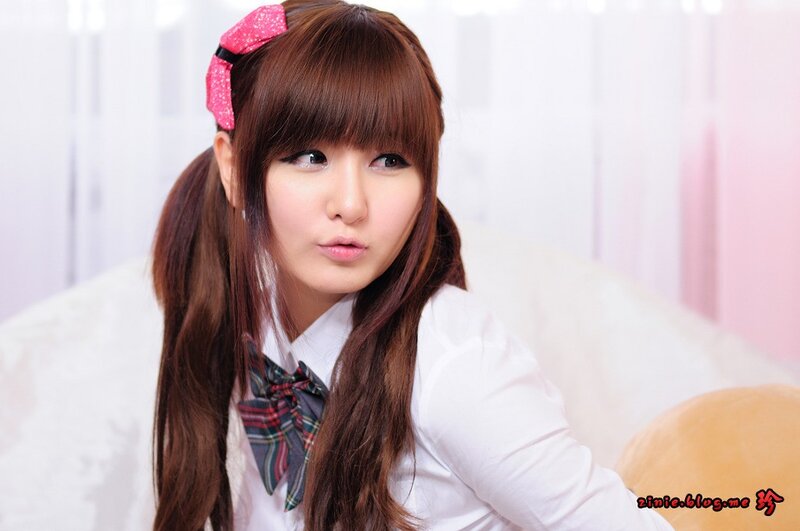 Young Woman with Pigtails — White