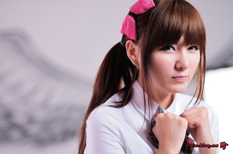 Young Woman with Pink Bow