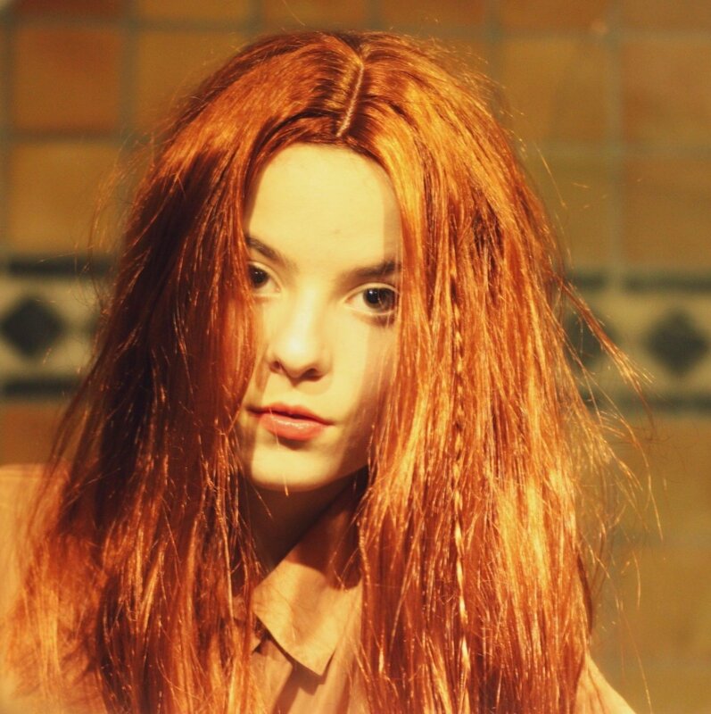 Young Woman with Red Hair — Dramatic