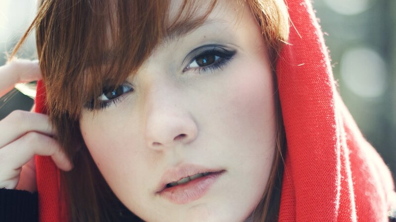 Young Woman with Red Hood