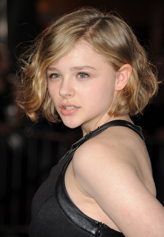 Young Woman with Short Hair — Black, Neutral, Photograph, Black Top, Short Hair