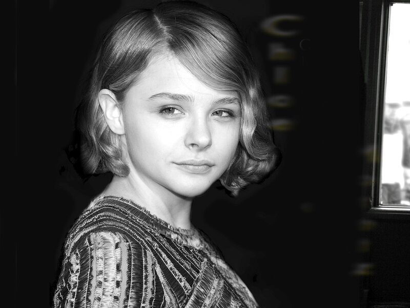 Young Woman with Short Hair — Black, Serious