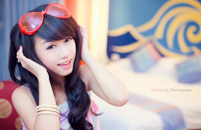 Young Woman with Sunglasses — Red