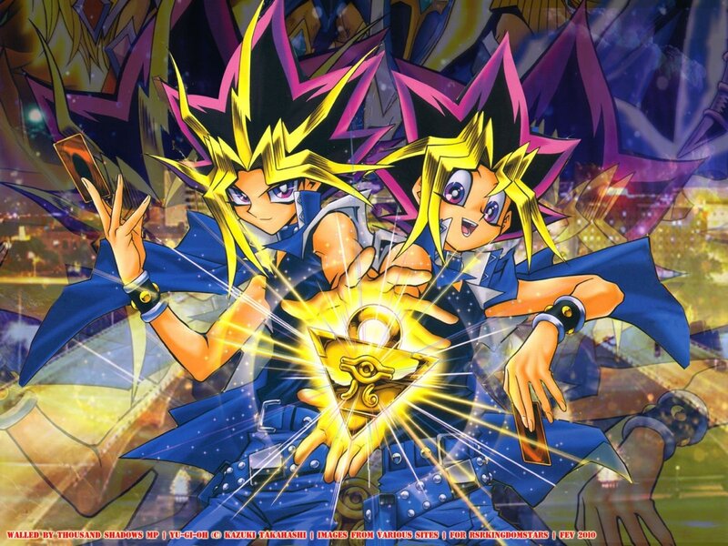 Yugi and Dark Yugi with the Millennium Puzzle