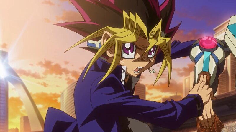 Yugi Mutou Holding Duel Disk