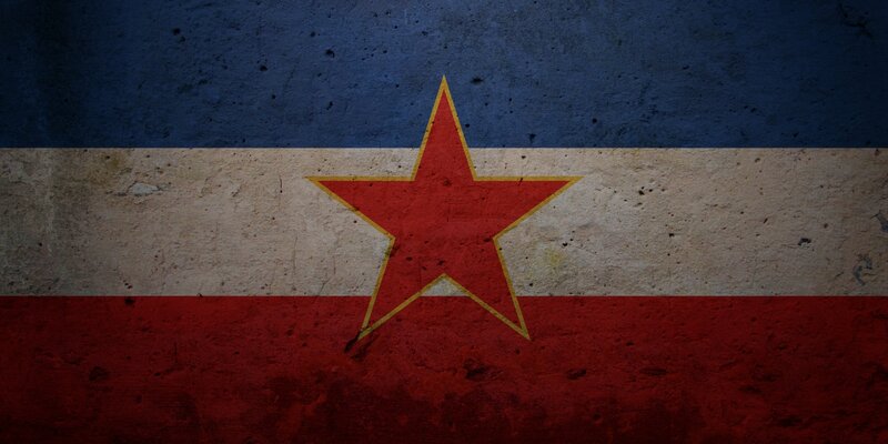 Yugoslav flag on textured wall