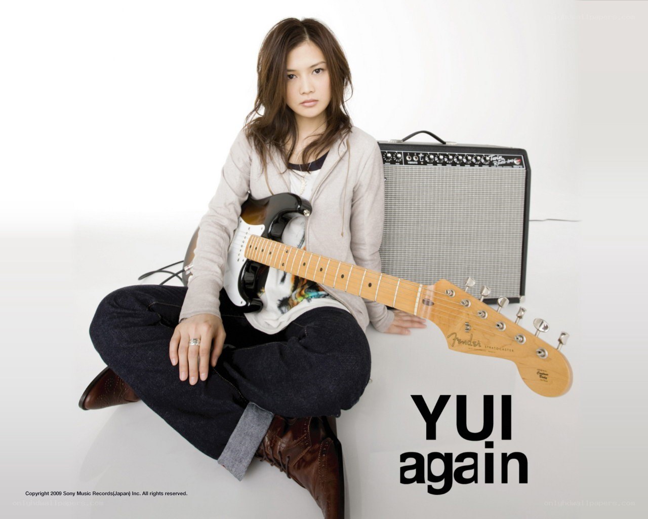 Yui with guitar and amp