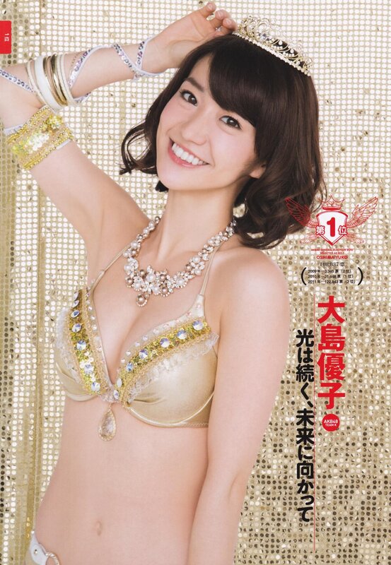 Yuko Oshima in gold outfit