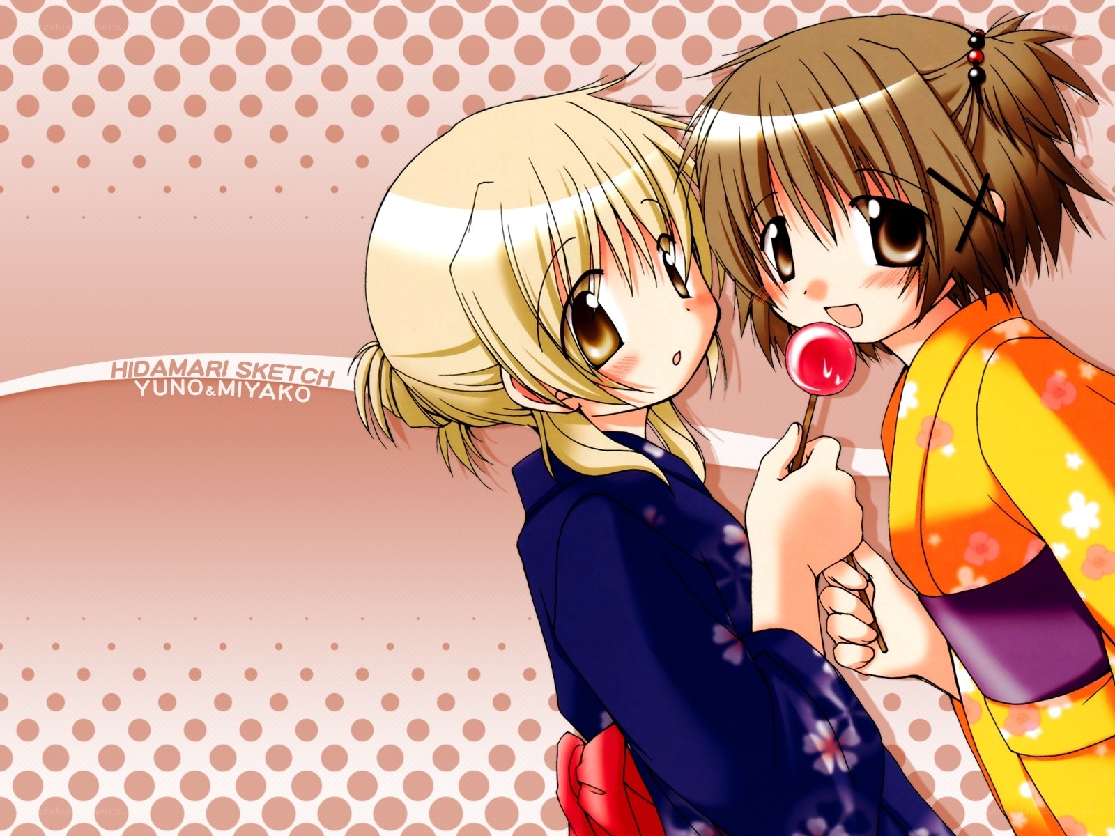 Yuno and Miyako sharing a lollipop