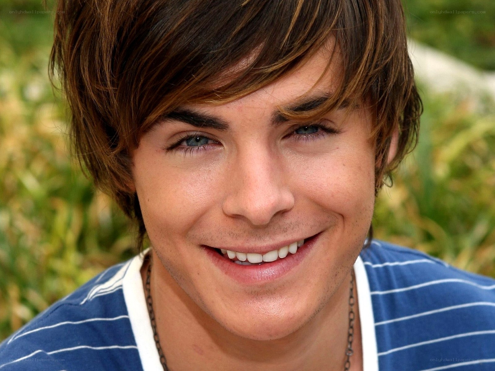 Zac Efron smiling outdoors