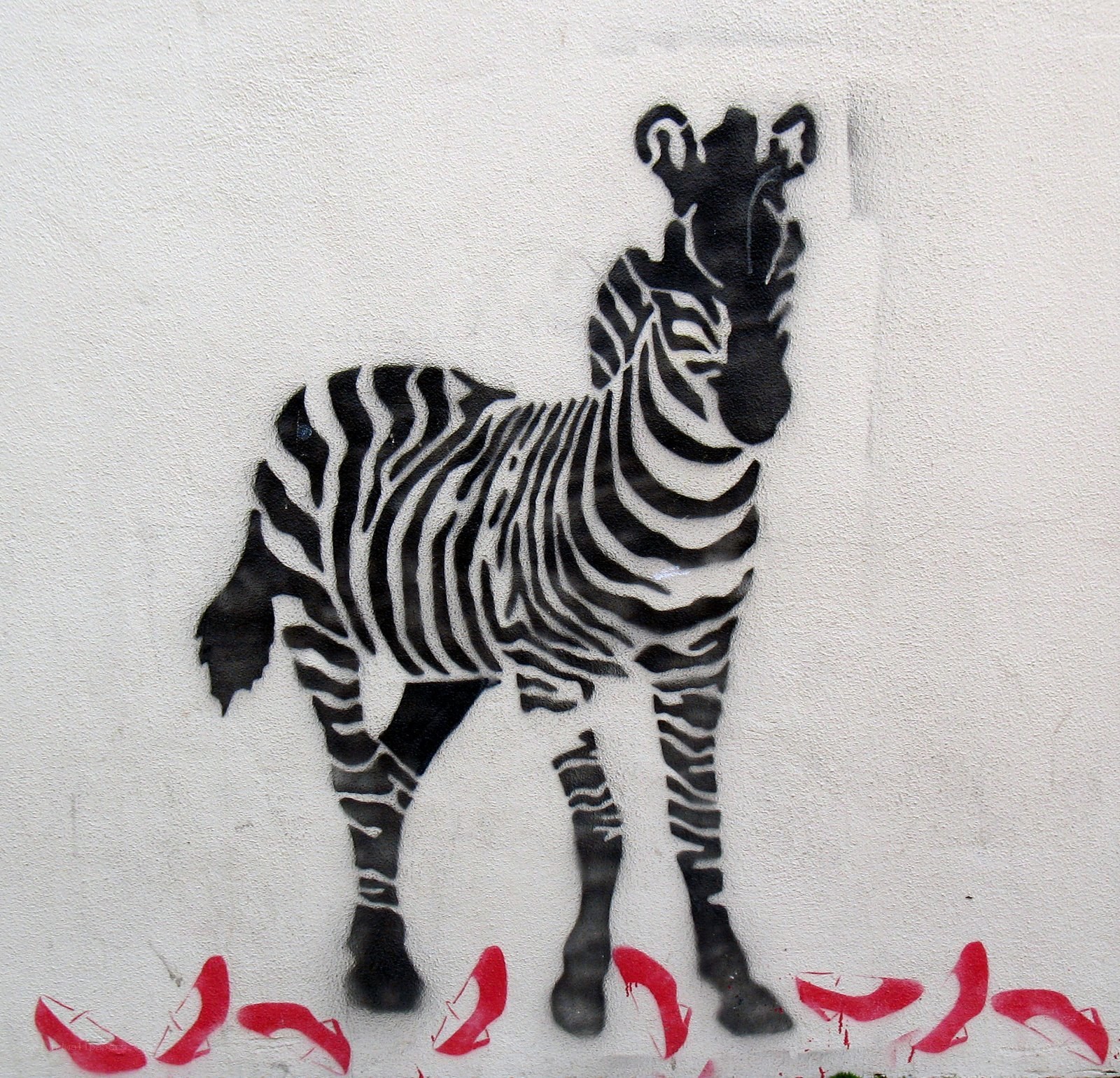 zebra graffiti with red shoes