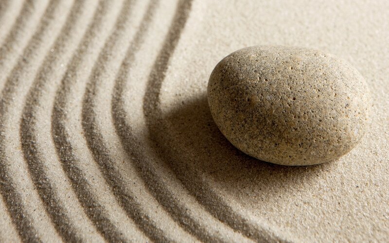 Zen garden stone and raked sand