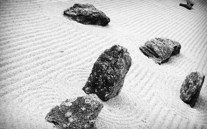 Zen garden with raked sand and rocks