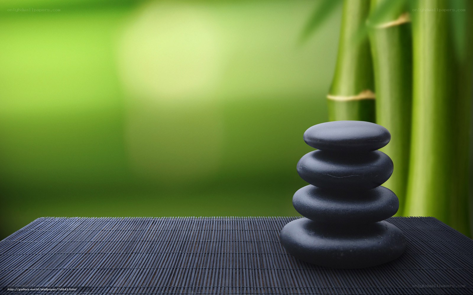 Zen stones on bamboo mat