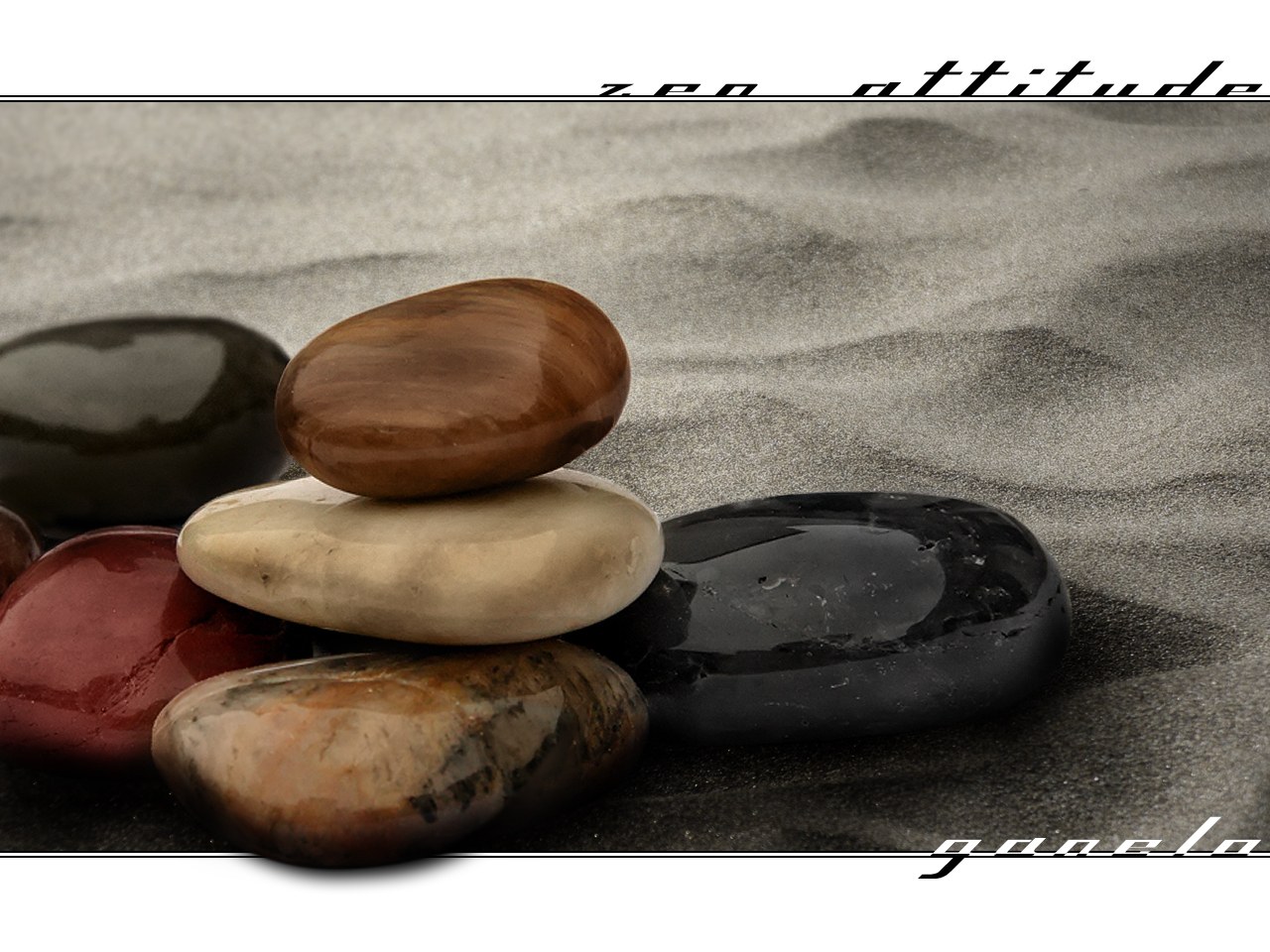 Zen stones on sand