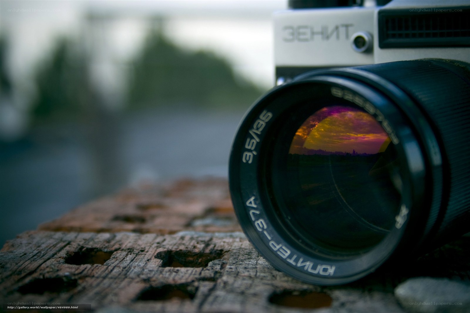 Zenit camera with sunset reflection