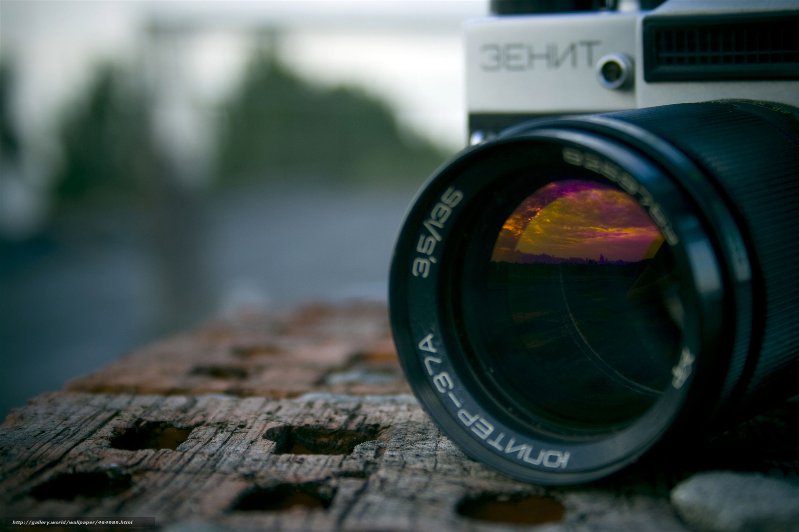 Zenit camera with sunset reflection