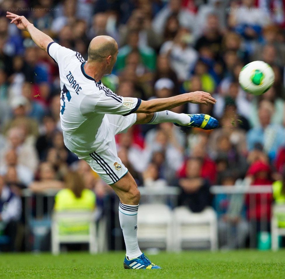 Zidane kicking a soccer ball