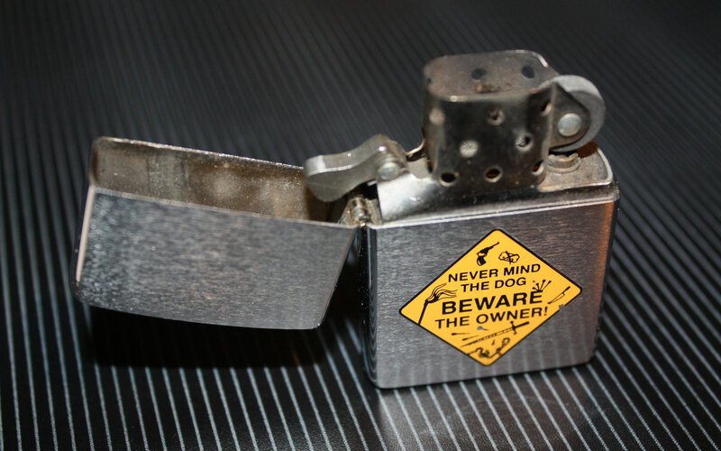 Zippo lighter with warning sticker