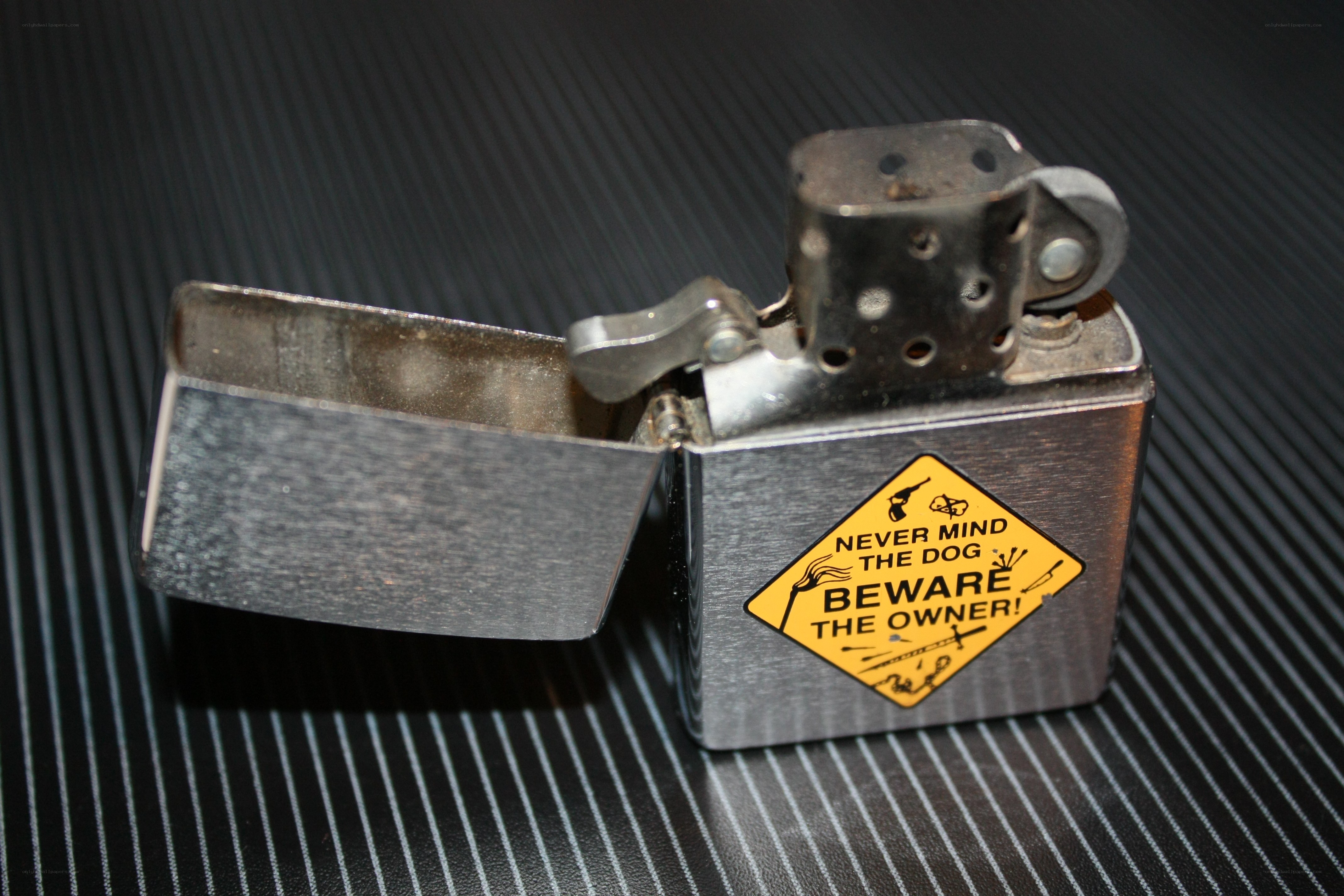 Zippo lighter with warning sticker