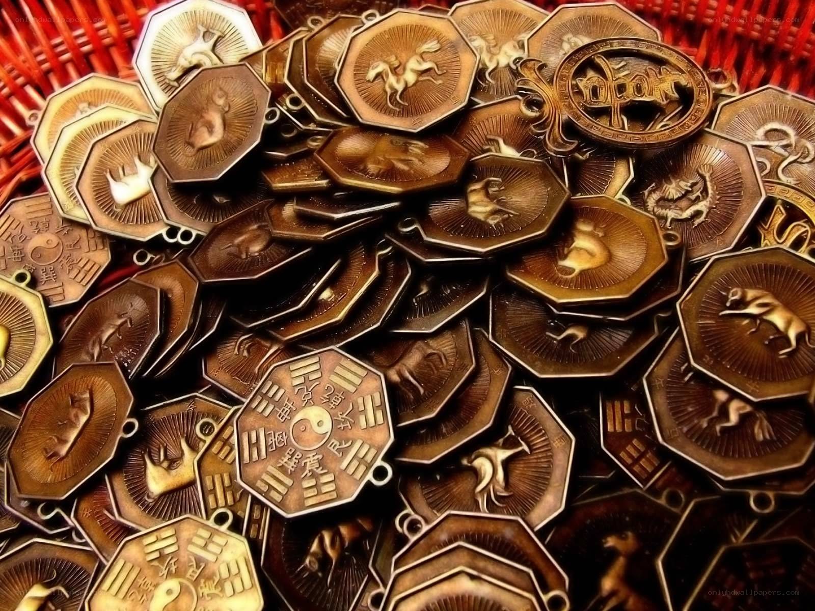 Zodiac charms in a basket