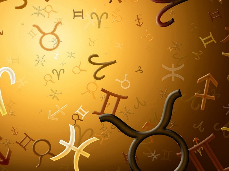 zodiac symbols on golden background