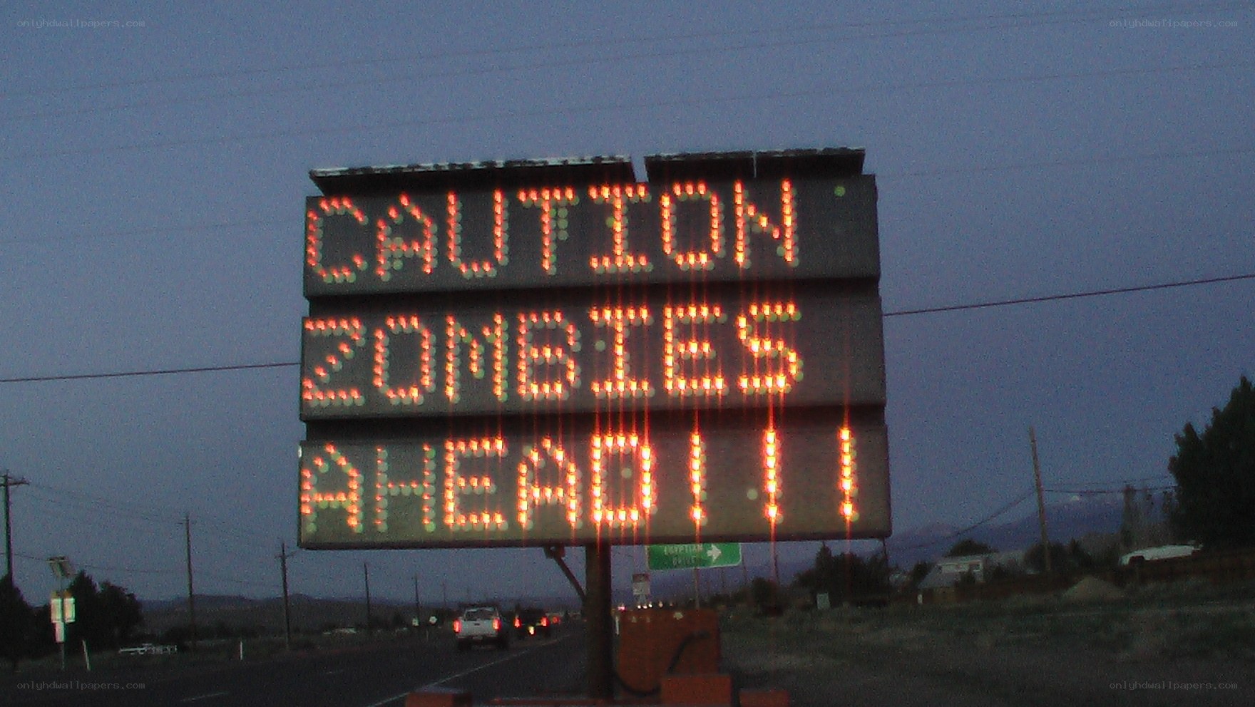 Zombie warning sign on road