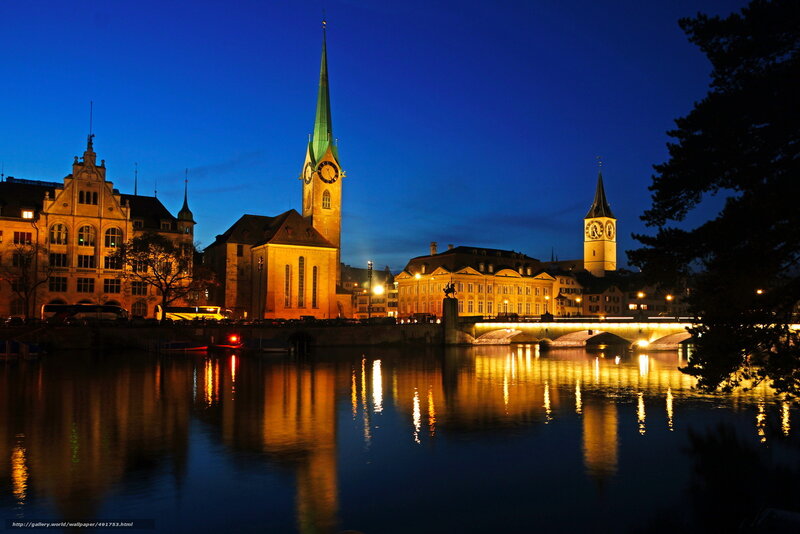 Zurich at night with river and church